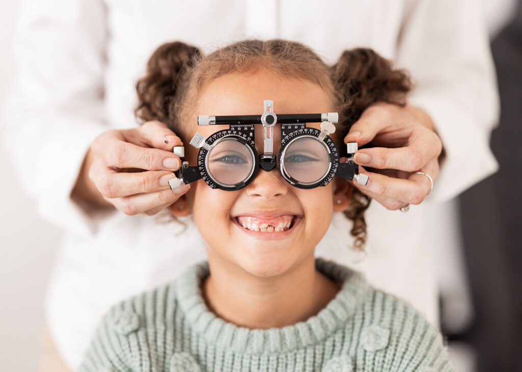 Vision, optometrist and portrait of child with glasses to test, check and examine eyesight. Healthcare, medical and young girl in doctor office for eye examination, optical diagnostic and examination