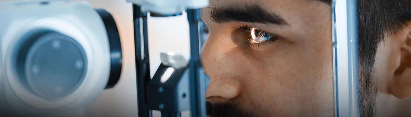 Stock image of male patient being examined by an optometrist