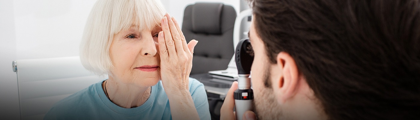 Older female patient being examined for cataracts (stock image)