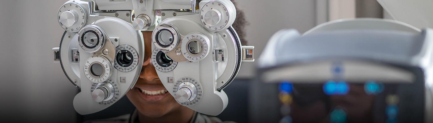 Patient having her eyes examined in an optometrist's office