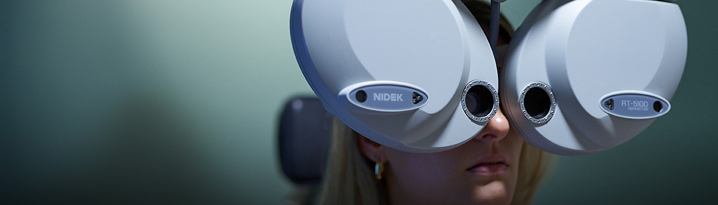 Female patient being examined with new technology at NECO Center for Eye Care - Commonwealth